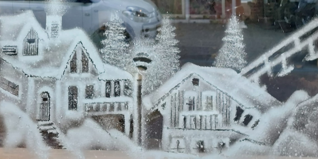 Sneeuwkunstwerk sneeuwhuisjes